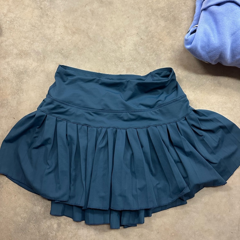 gold hinge athletic skirt with built in shorts
